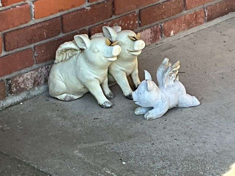 Trio of flying pigs image