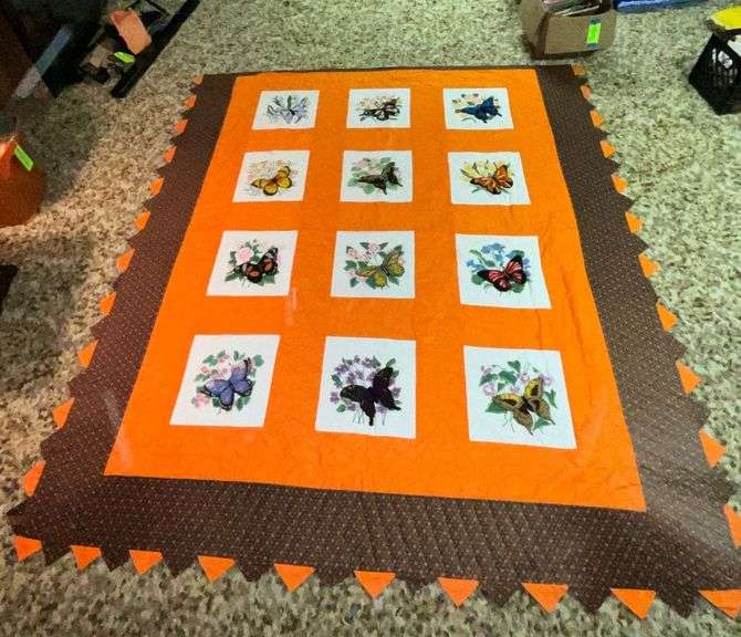 Butterfly quilt, shows fading and a stain image