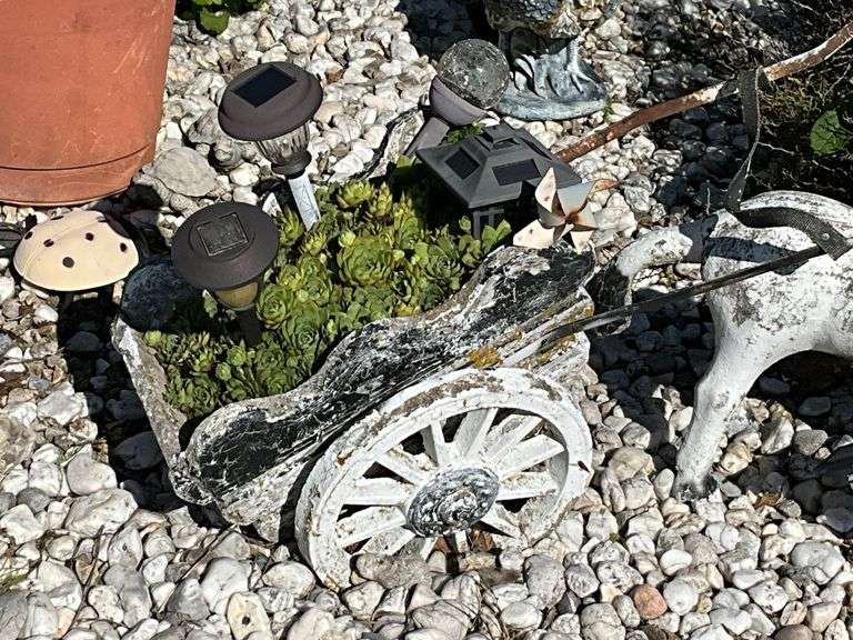 Concrete donkey and cart