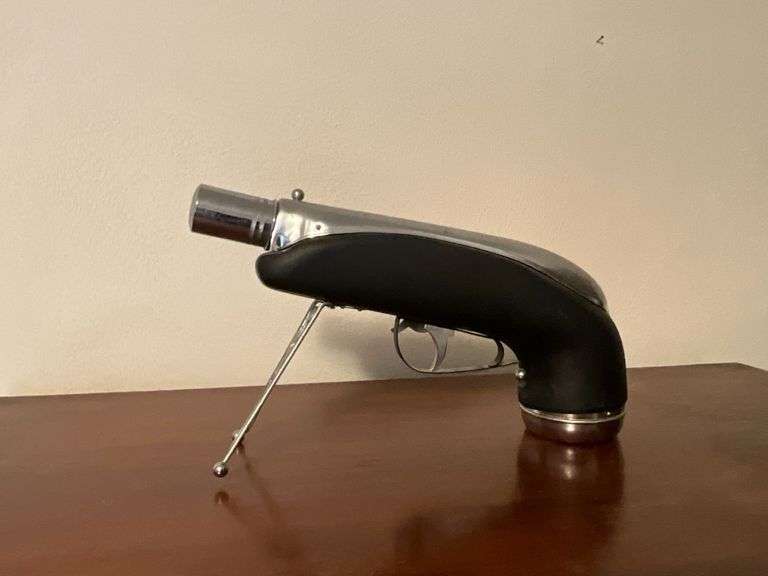 Musical pistol flask image