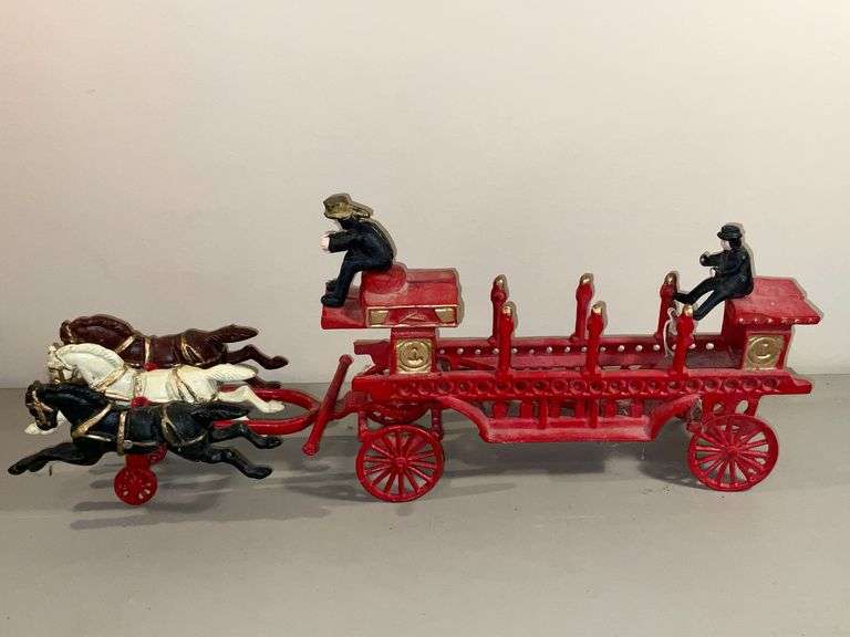 Cast iron horse drawn fire engine image