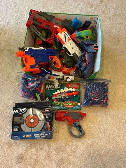 Assortment of Nerf guns and bullets image
