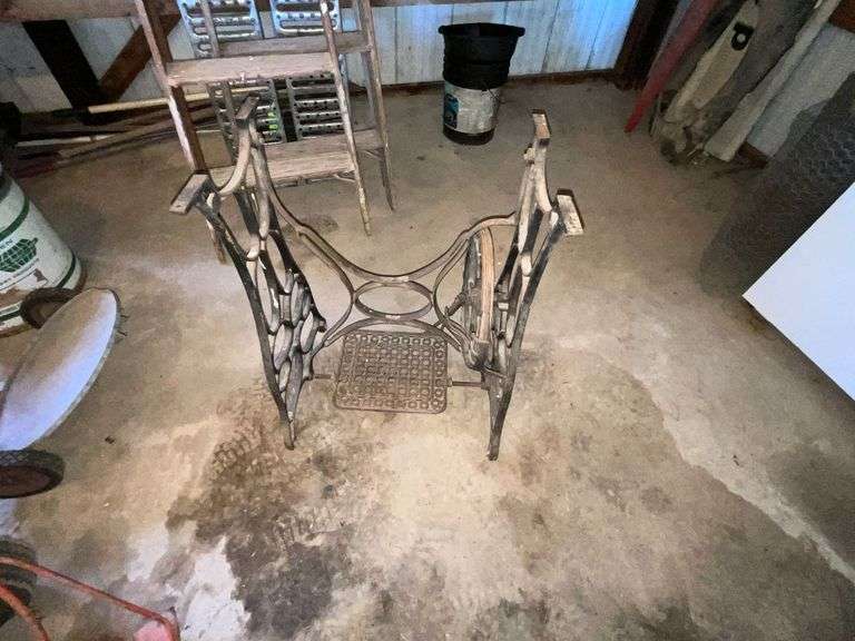 Treadle sewing machine base, with casters. image