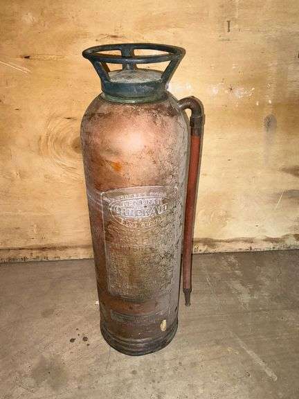 Quick Aid brass fire extinguisher image