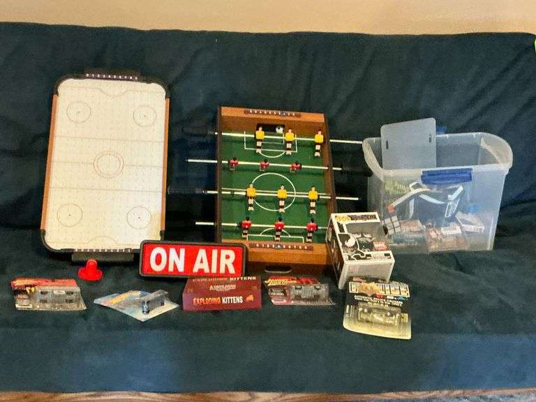 Table top air hockey and foosball, Hot Wheels and Johnny Lightning die cast cars image