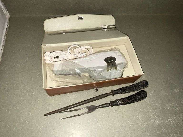 Dominon electric knife in case,  meat fork image