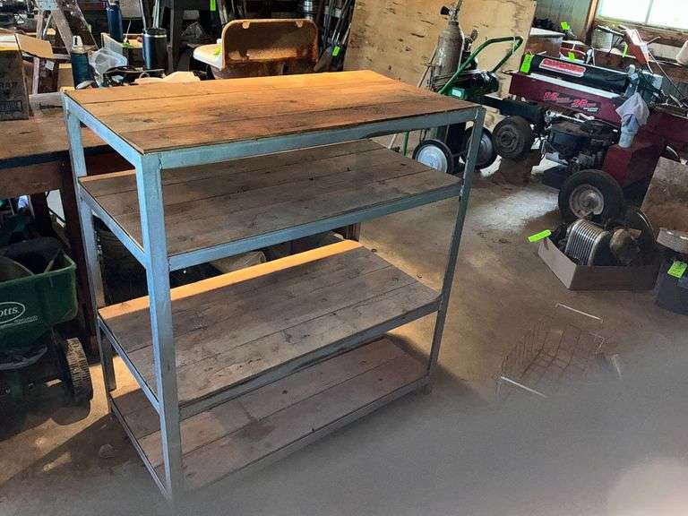 Metal framed shelf with wooden shelves image