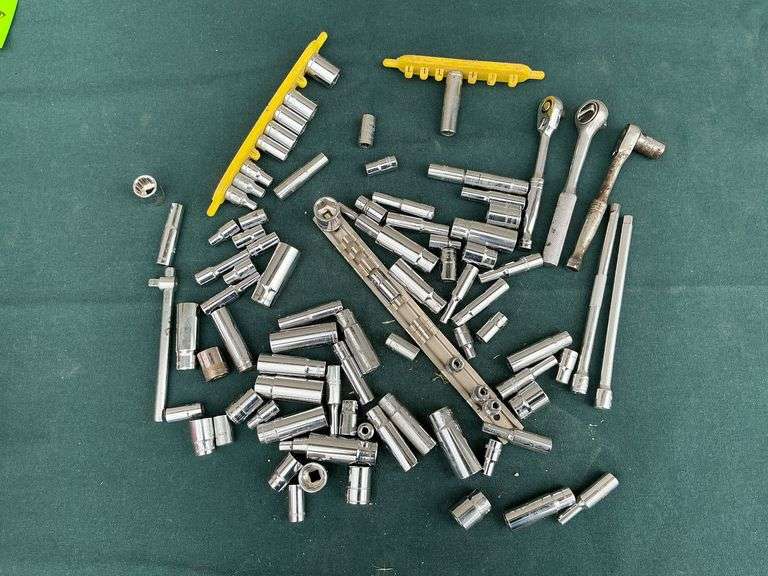 Assortment of 1/4" ratchet and sockets image