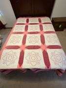 Embroidered quilt, some fading, hand quilted