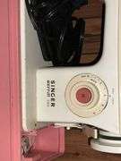 Singer Merritt 2404 sewing machine with attachments