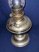 Magnet metal base oil lamp