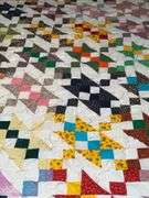 Jacob's ladder quilt, hand tied
