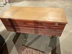 Lane cedar chest on legs, water damage on one end to the veneer