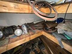 Gauges, box fans, tractor lights, barrel half full of car wash soap, etc.