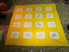 Embroidered blocks flower quilt