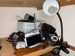 Office supplies, desk lamp, telephones, alarm clocks