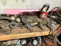 Gauges, box fans, tractor lights, barrel half full of car wash soap, etc.