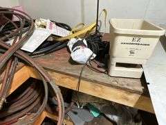 Gauges, box fans, tractor lights, barrel half full of car wash soap, etc.