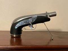 Musical pistol flask