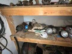 Gauges, box fans, tractor lights, barrel half full of car wash soap, etc.