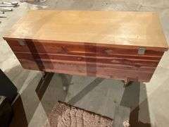 Lane cedar chest on legs, water damage on one end to the veneer