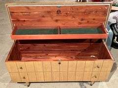 Lane cedar chest on legs, water damage on one end to the veneer