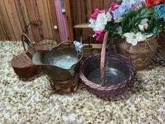 Floral arrangement, coal scuttle, baskets