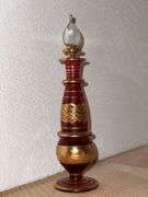 Ruby and gold decorated perfume bottle