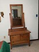 Three-drawer antique dresser with mirror, split in side