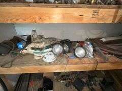 Gauges, box fans, tractor lights, barrel half full of car wash soap, etc.