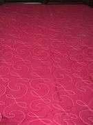 Whole cloth machine quilted quilt