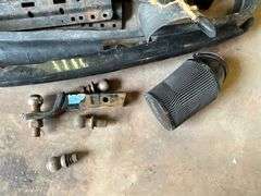 Assortment of truck parts, ball hitches