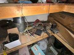 Gauges, box fans, tractor lights, barrel half full of car wash soap, etc.