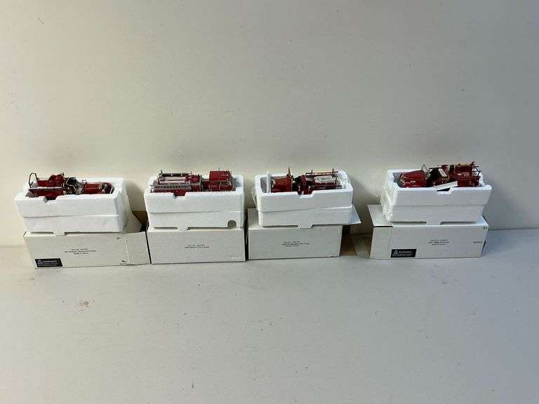 Set of 4 die cast fire trucks image