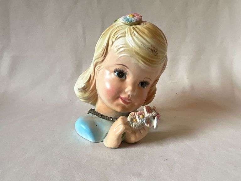 Little girl with flower lady head vase image