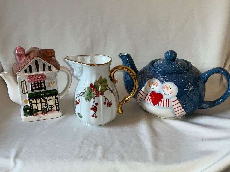 Pair of teapots and a pitcher image