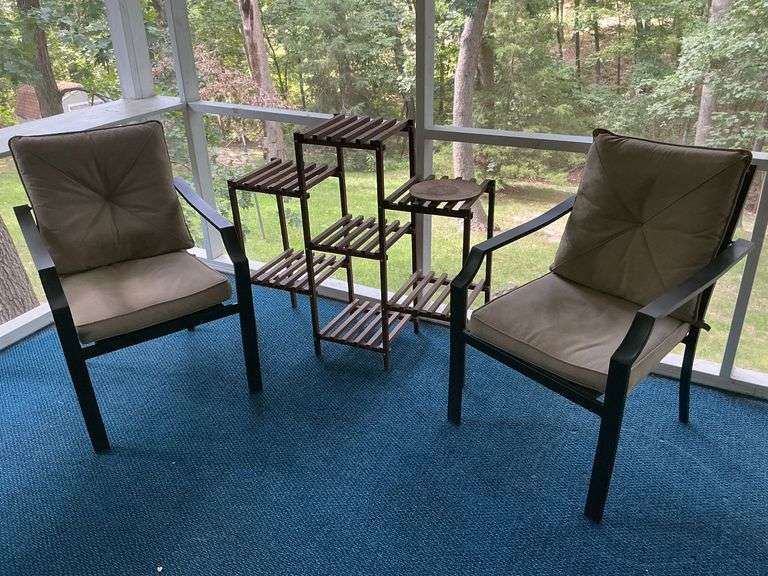 Pair of patio chairs with cushions image