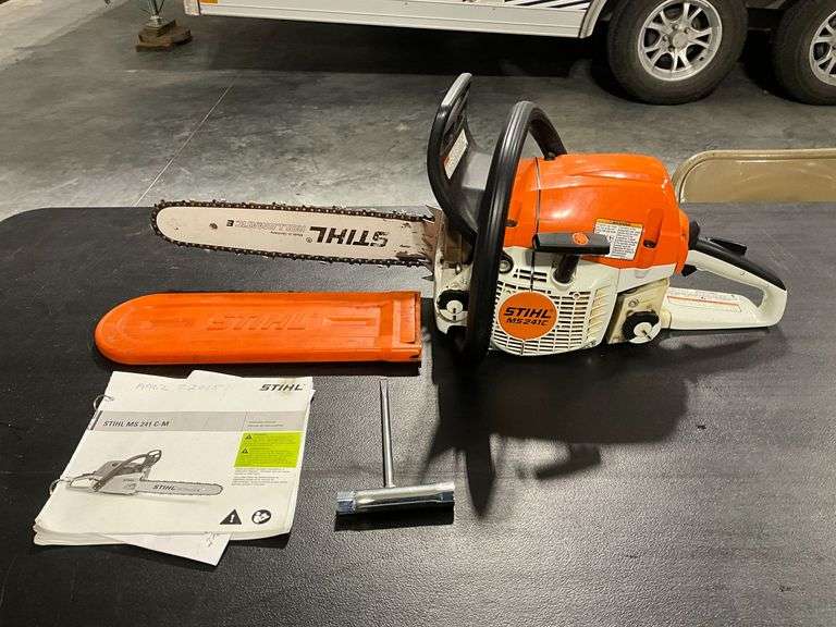 Stihl MS 241C chainsaw, 14" bar, chainsaw tool, owner's manual image