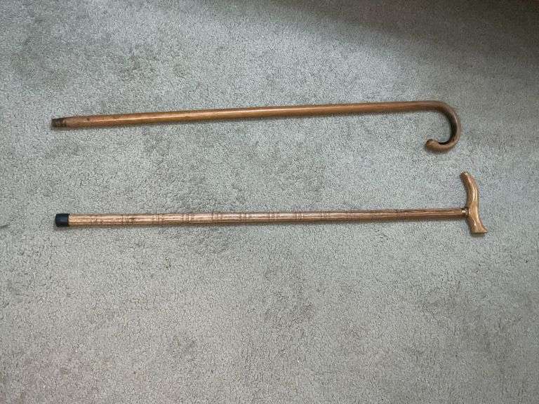 Pair of wooden canes image