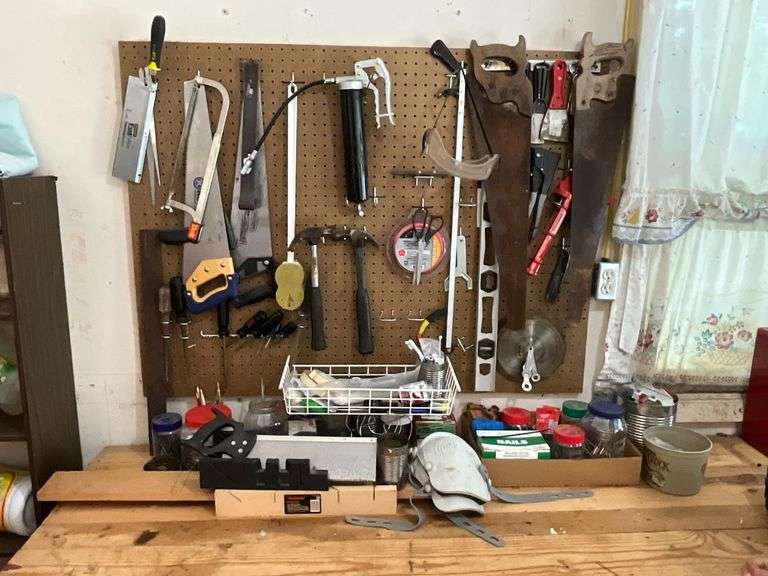 Contents of peg board and below pegboard image