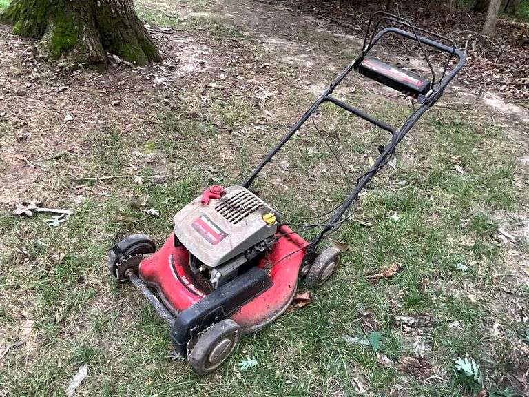 Yard Machines 21" cat self propelled mower, 5 hp engine with compression image