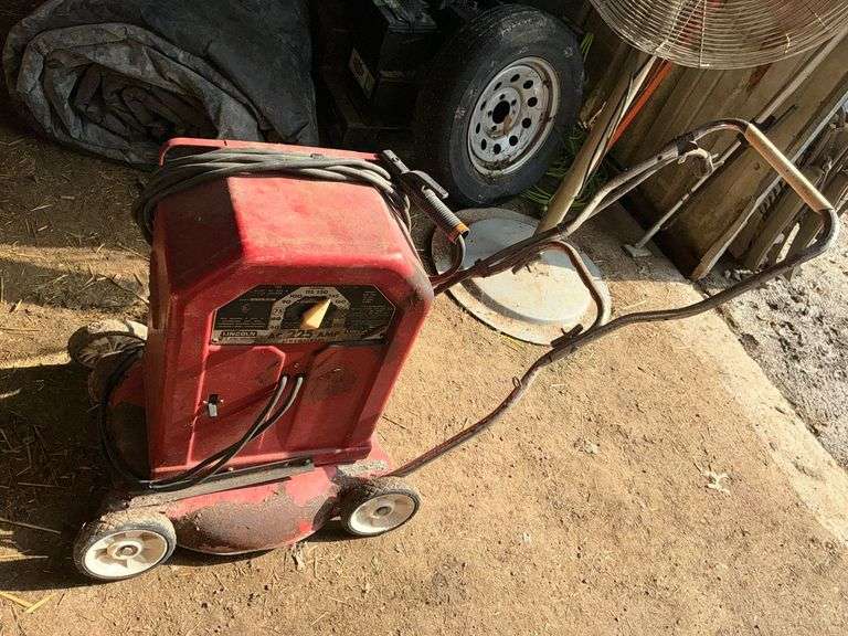 Lincoln 225 amp arc welder, mounted on lawn mower handle image