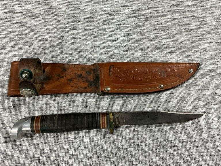 Western sheath knife, 3 1/2" blade leather wrapped handle, very sharp image