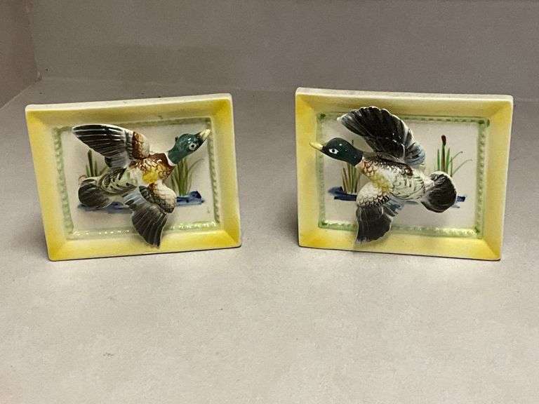 Pair of duck wall pockets marked "4511" on the back of both image