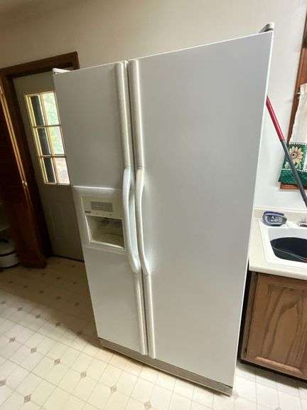Kenmore side by side refrigerator with ice and water in the door image