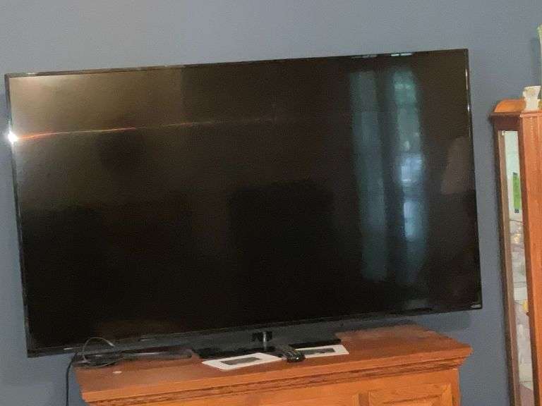 Vizio 70" smart TV with remote image