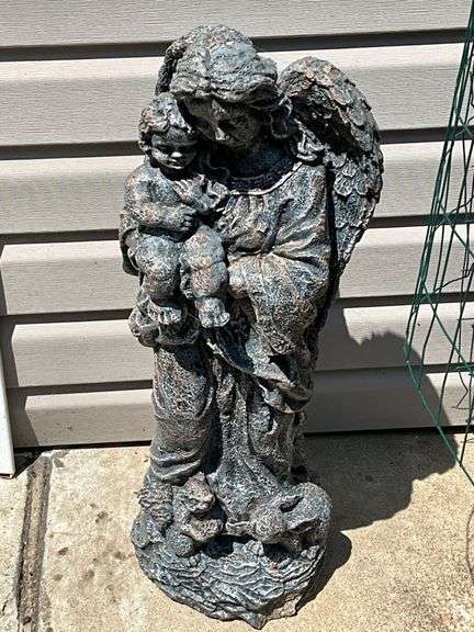 Concrete angel with child image
