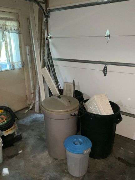 Trash cans and scrap metal image