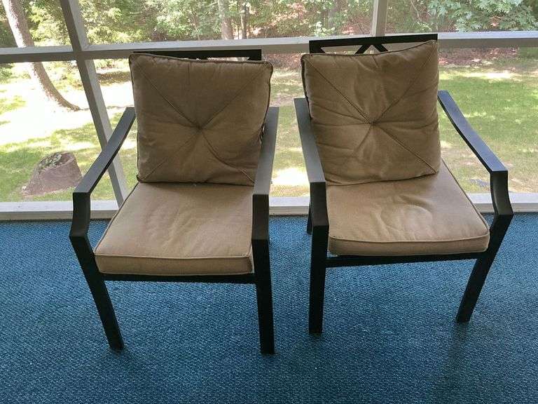 Pair of patio chairs with cushions image
