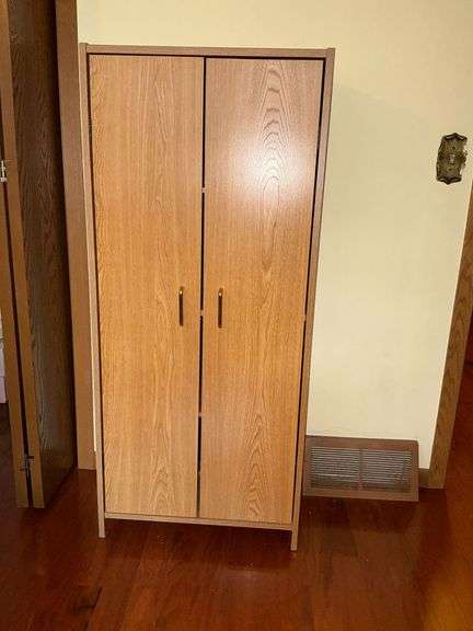 Pressed wood 2-door cabinet with 4 shelves image